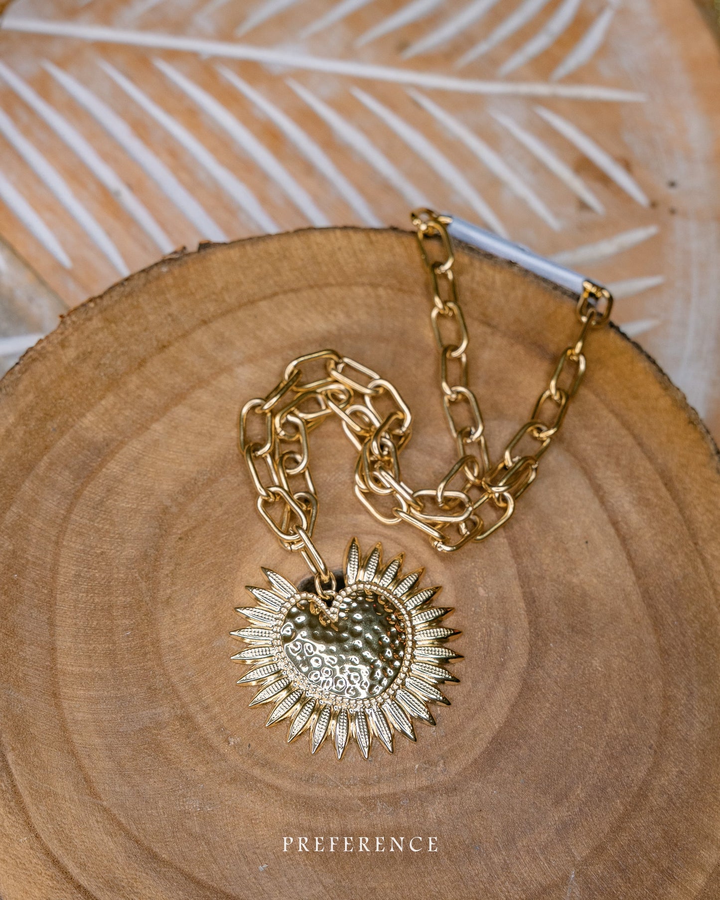 Collier soleil acier inox